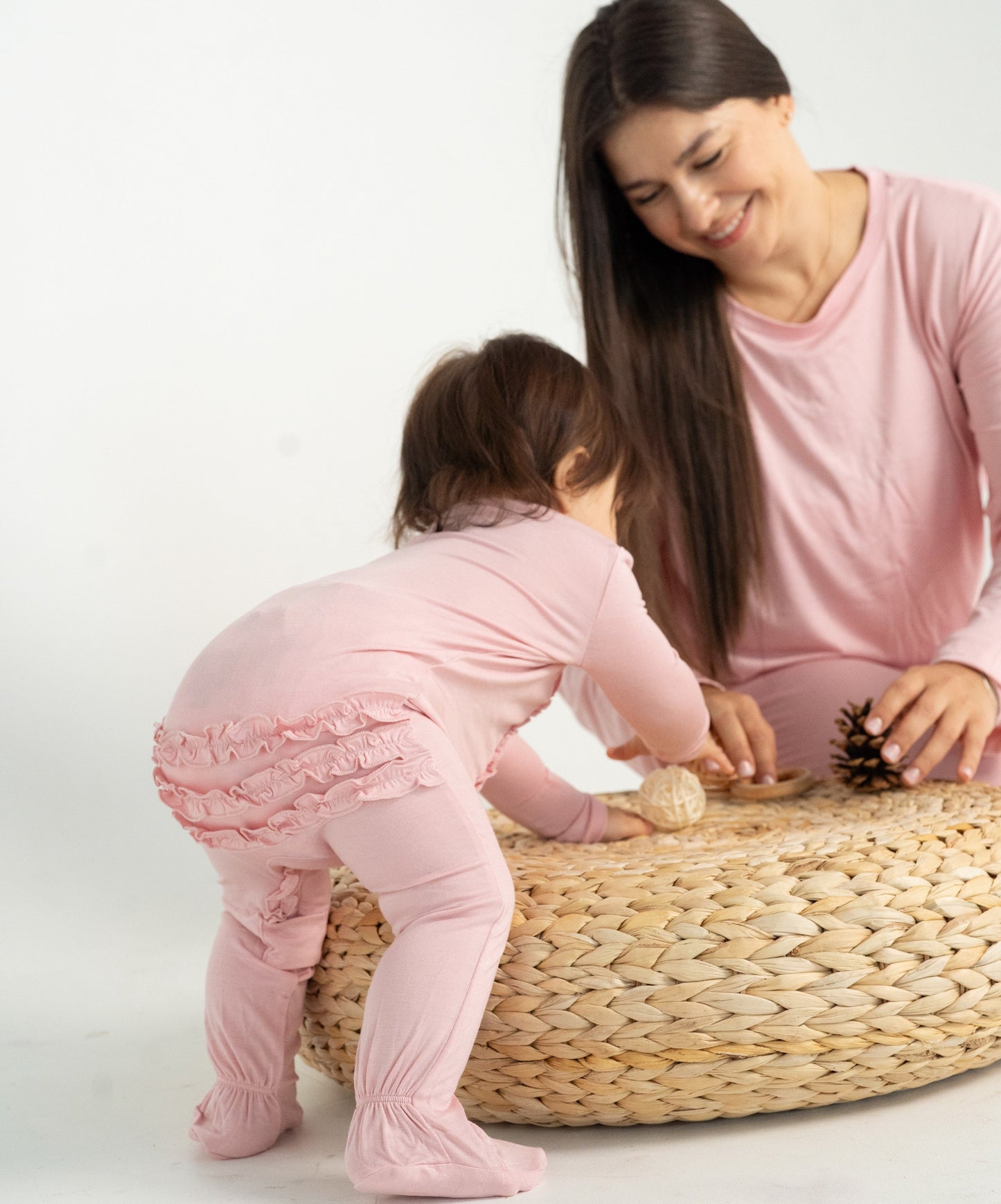 bamboo ruffle footies with two way zipper coral blush